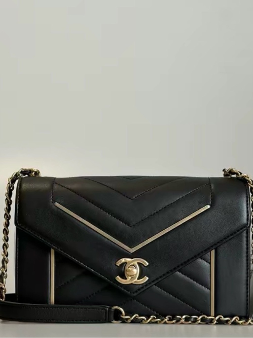 Chanel calfskin envelope Crossbody bag small chevron black and gold